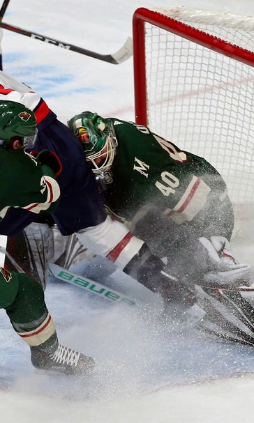 Suspension over early, Wilson helps lead Caps past Wild